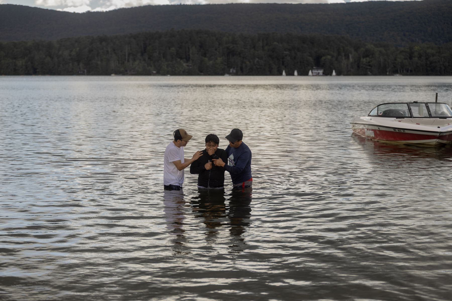 A baptism in the lake at Family Camp