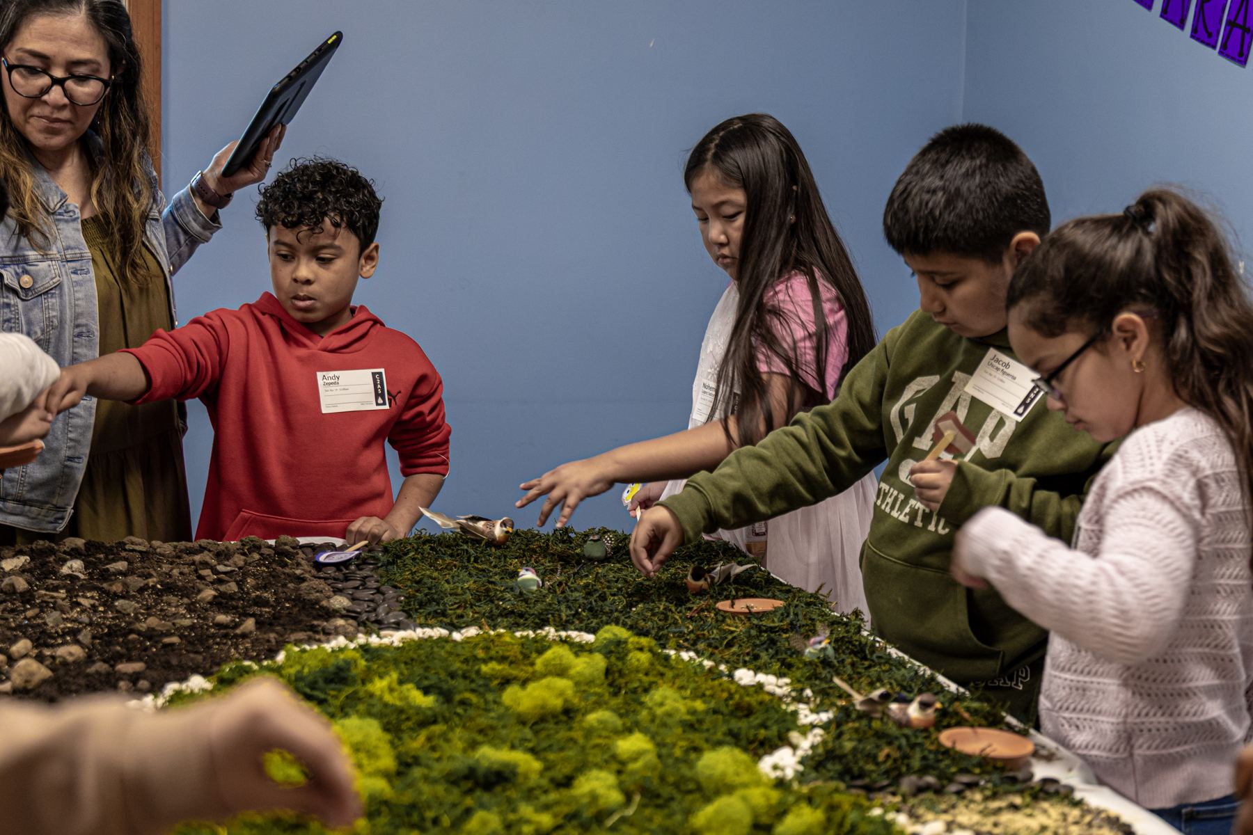 Children at a craft table in Living Kids